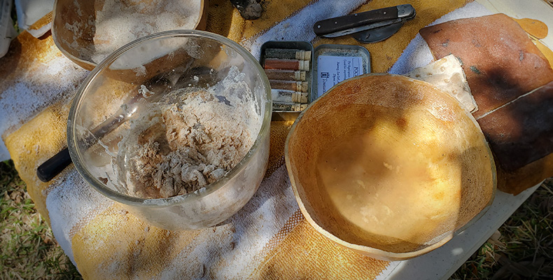 Making dough for camp bread.