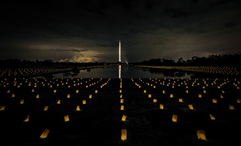 Luminarias surround the reflection pool near the San Jacinto Monument