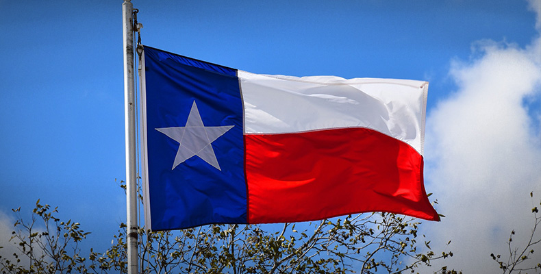 The Lone Star flag of Texas, flying in the breeze.