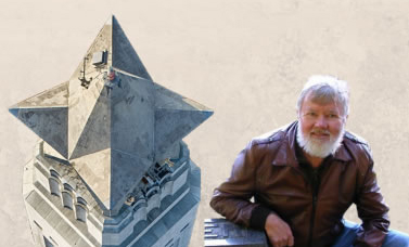 The star at the top of the San Jacinto Monument is shown with a man with a white beard and wearing a brown jacket with his elbow resting on a box