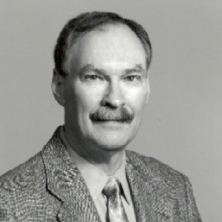 Head and shoulders photo of James E. Crisp