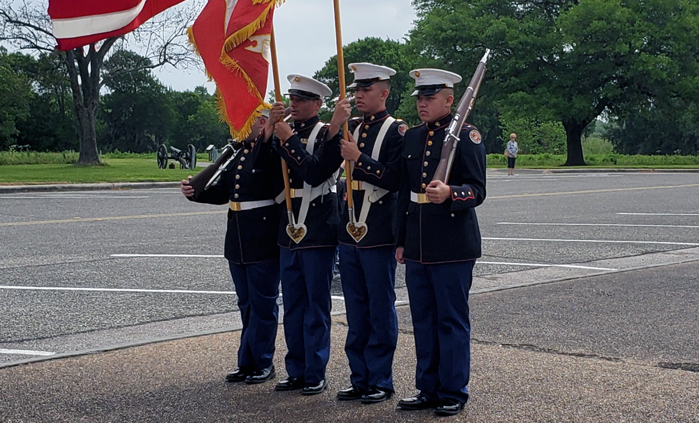 Four Marines serve as a color guard
