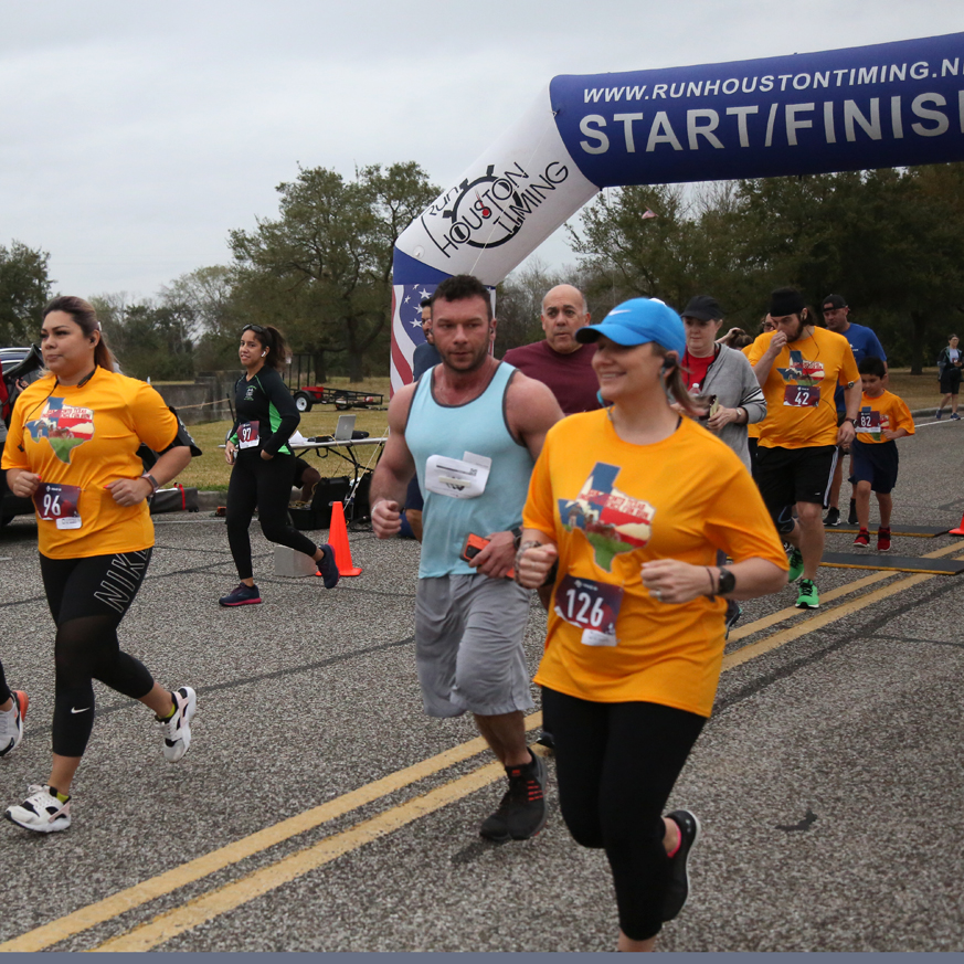 Runners leave the starting line